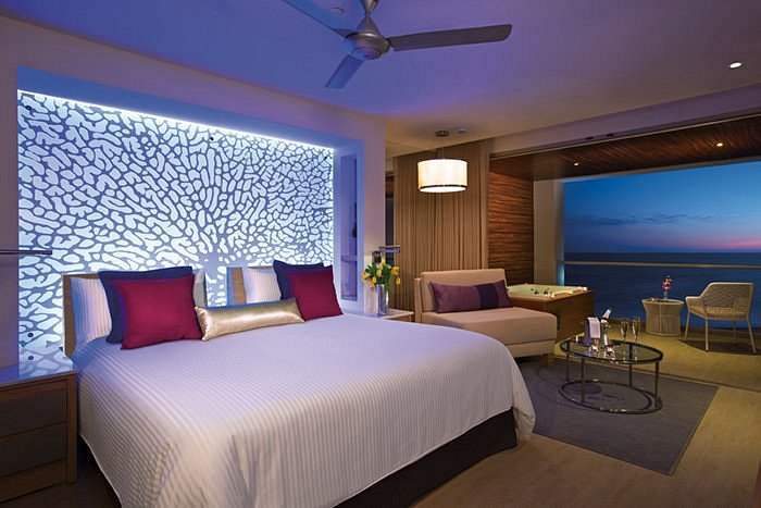 Modern suite at Breathless Riviera Cancun with private balcony